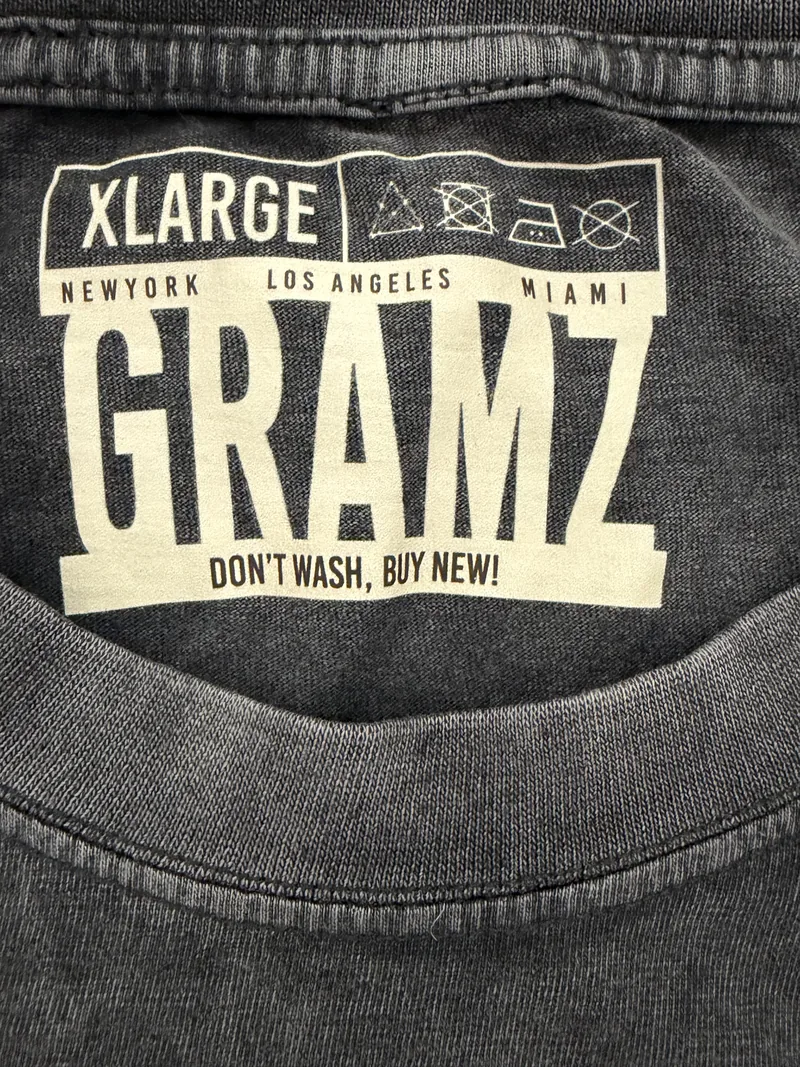 Close-up of the printed GRAMZ neck label inside the collar, size XLARGE